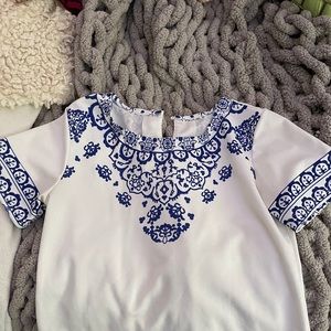 White and blue patterned t